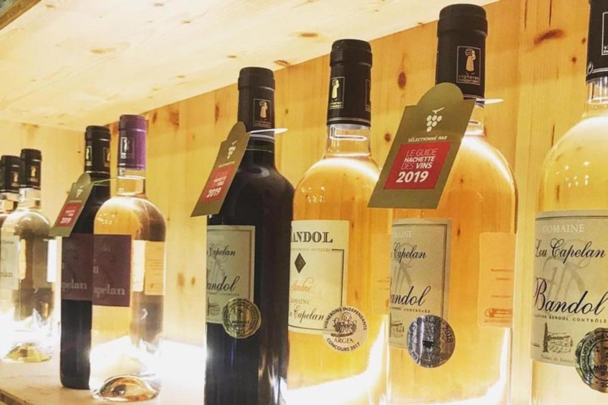 a bunch of bottles of wine on a shelf