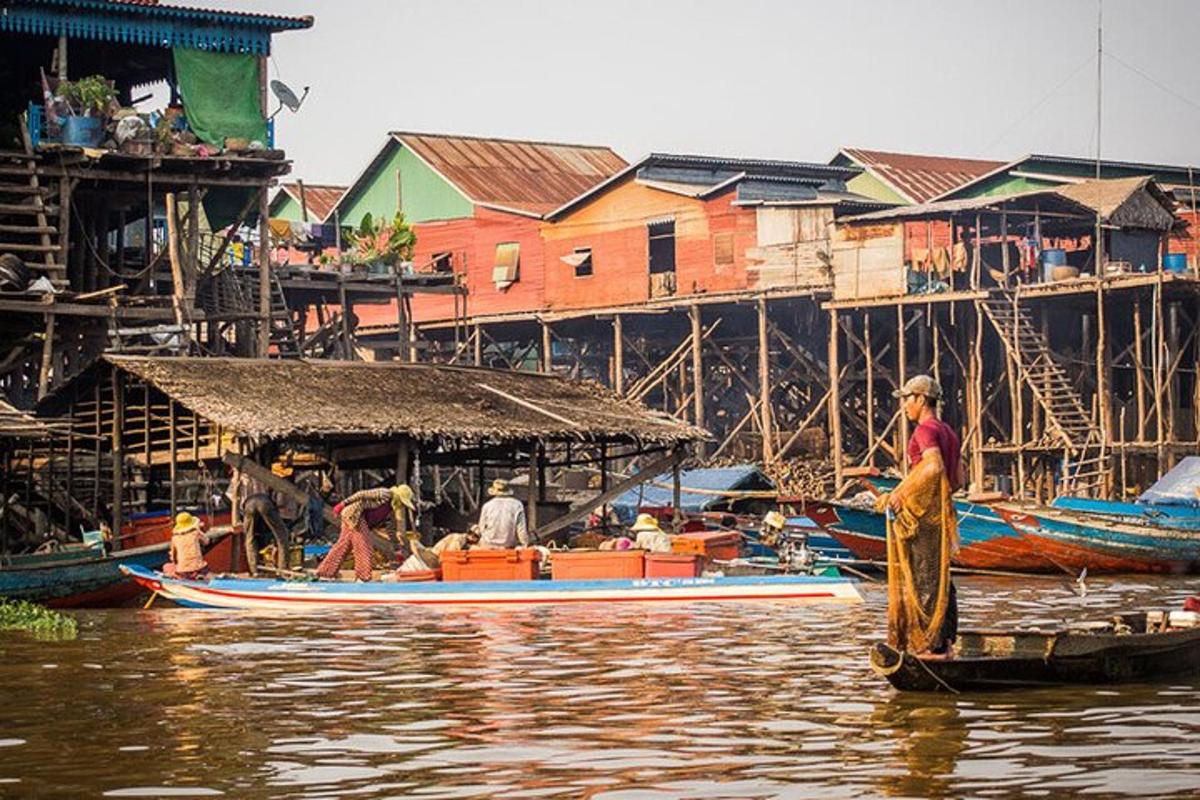 a group of people on a boat in the water