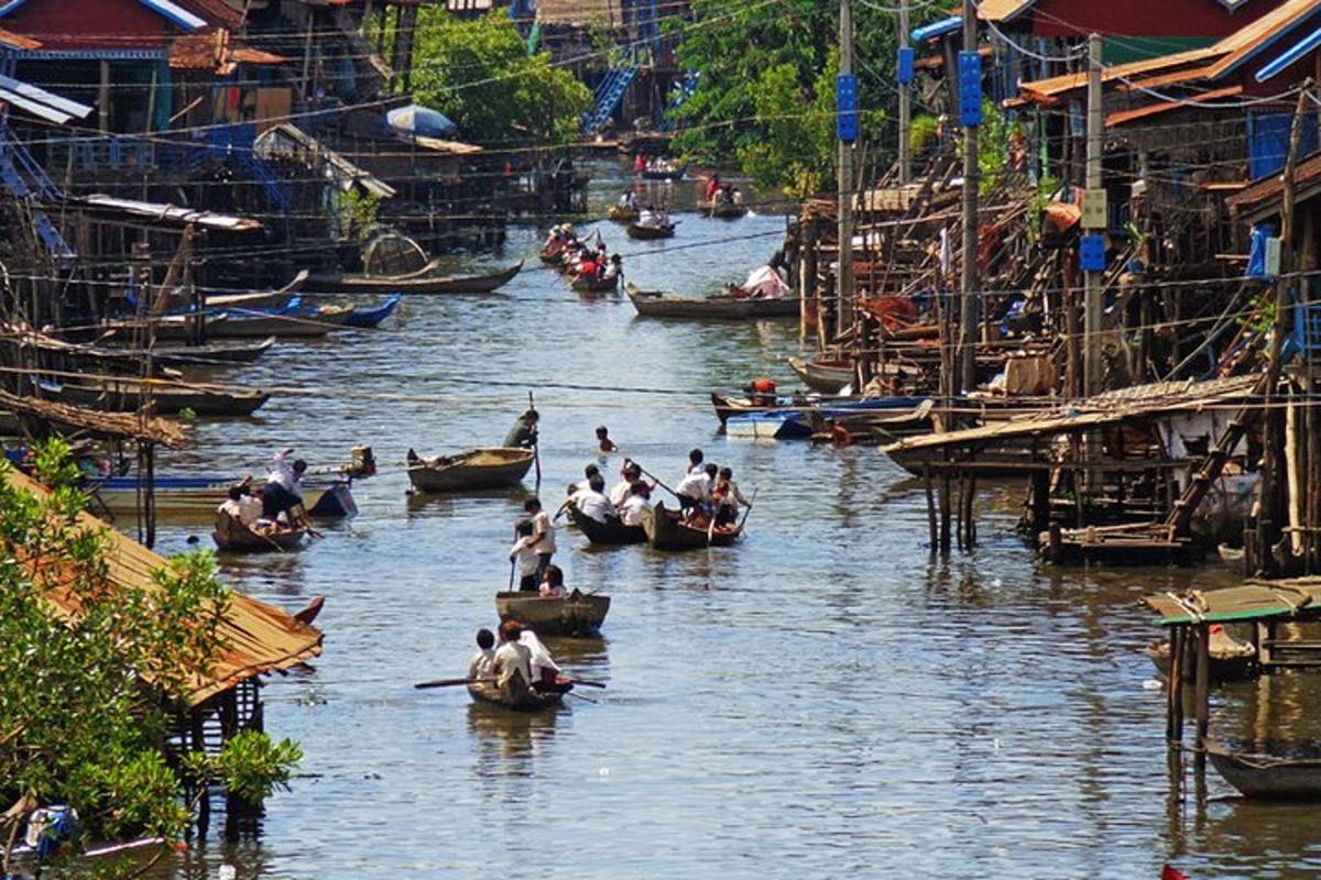 a group of people in boats on a river