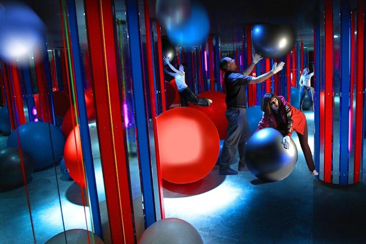 two people are playing on a playground