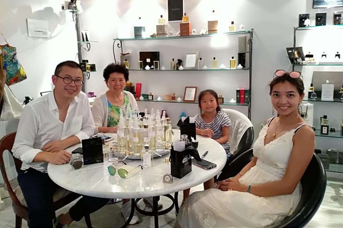 a group of people sitting around a table
