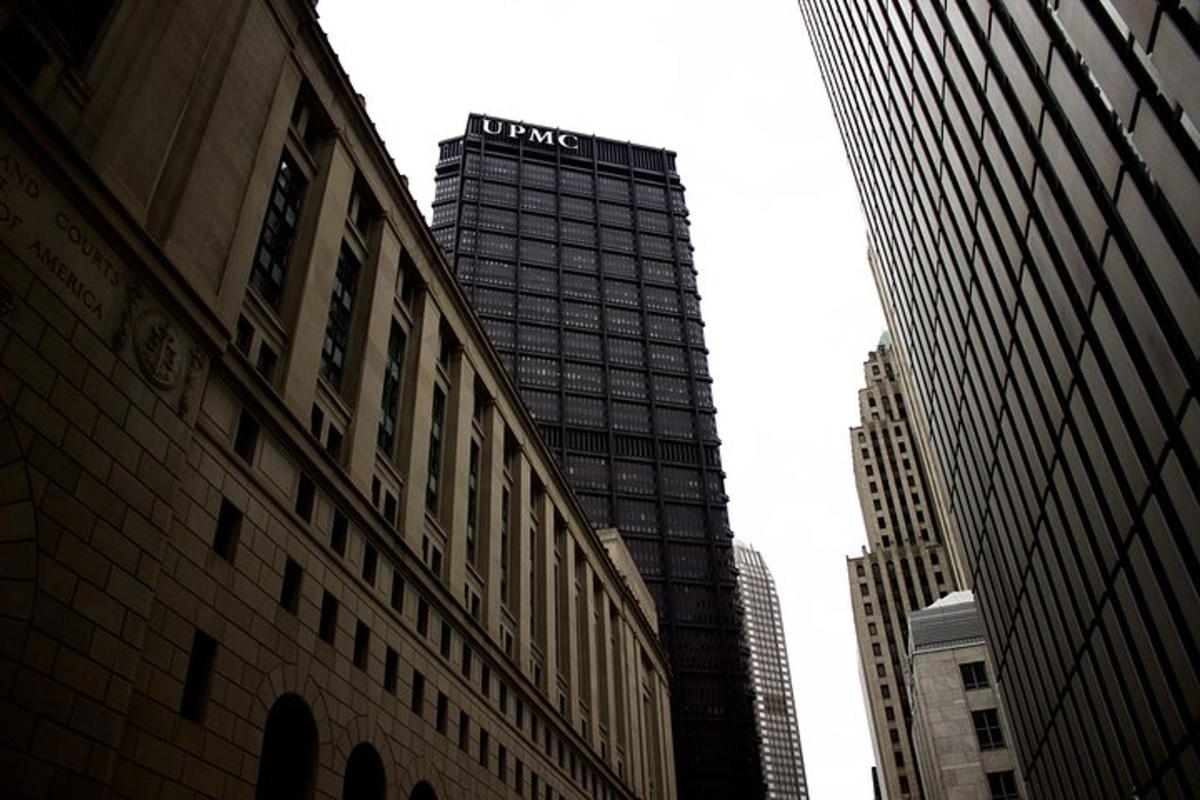 a tall building with a sign on top of it