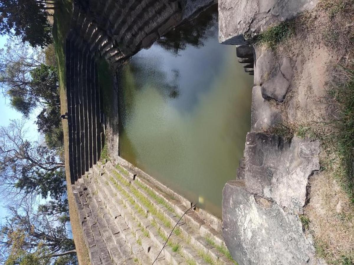 a view of a body of water through a wall