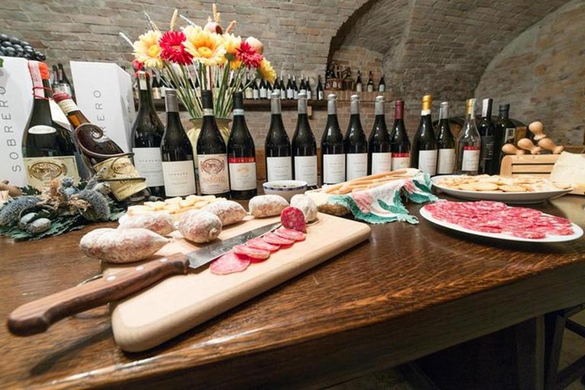 a table with a bunch of bottles of wine