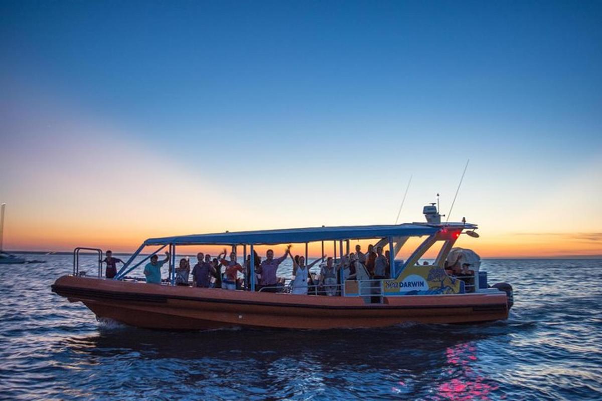 a group of people on a boat in the water