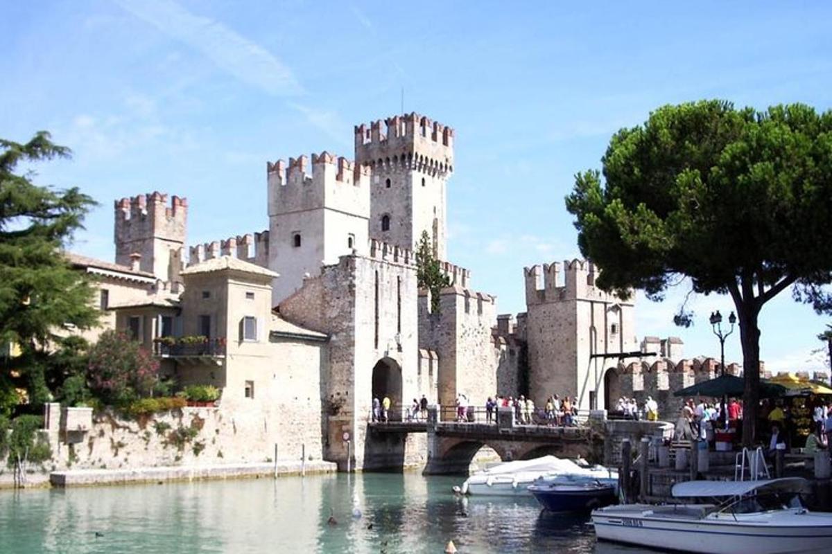 a large castle with a bridge over a body of water