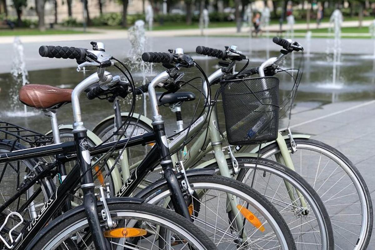 a group of bikes parked next to a fountain