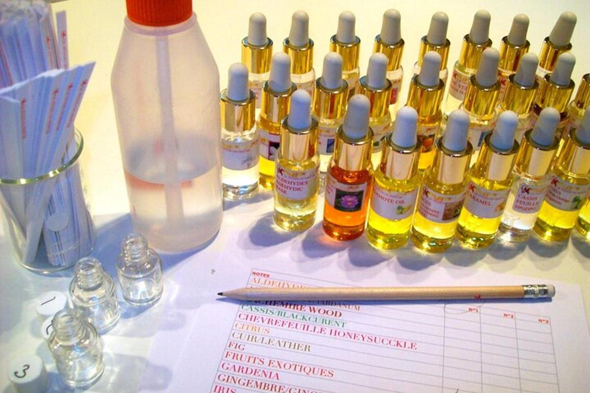a group of bottles of essential oils sitting on a table