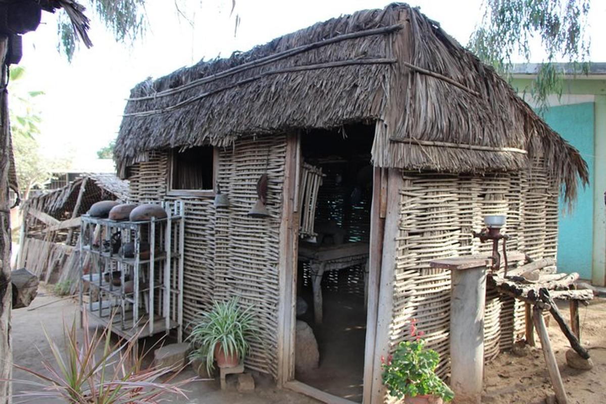 sebuah rumah kecil dengan bumbung jerami
