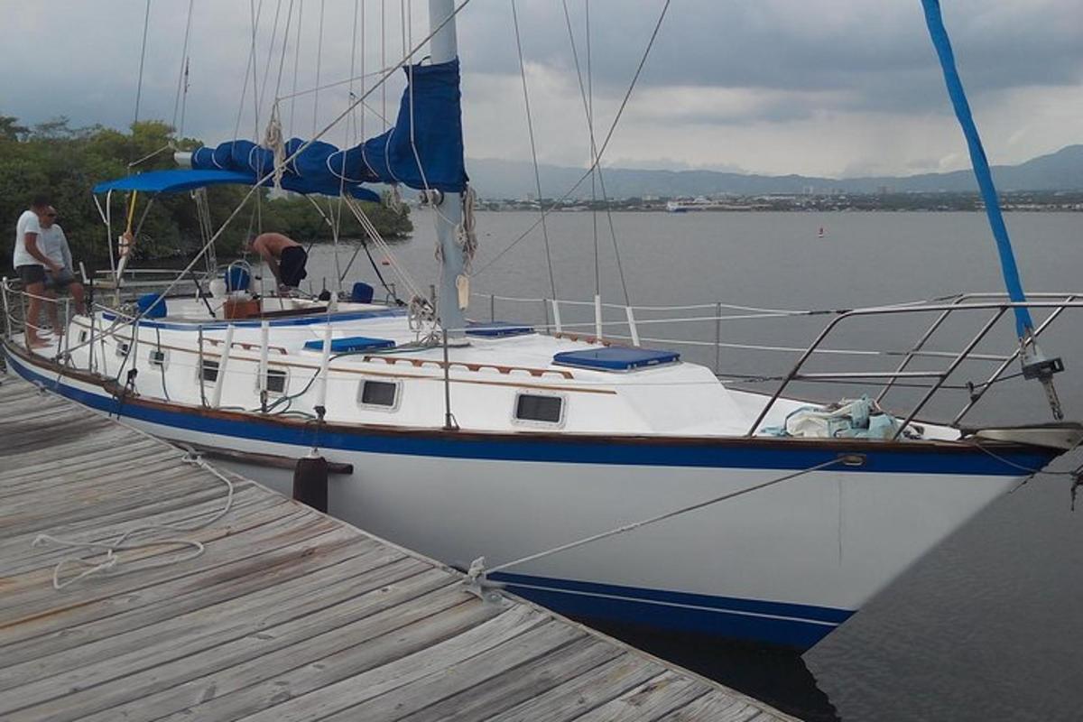 a boat is docked at a dock in the water