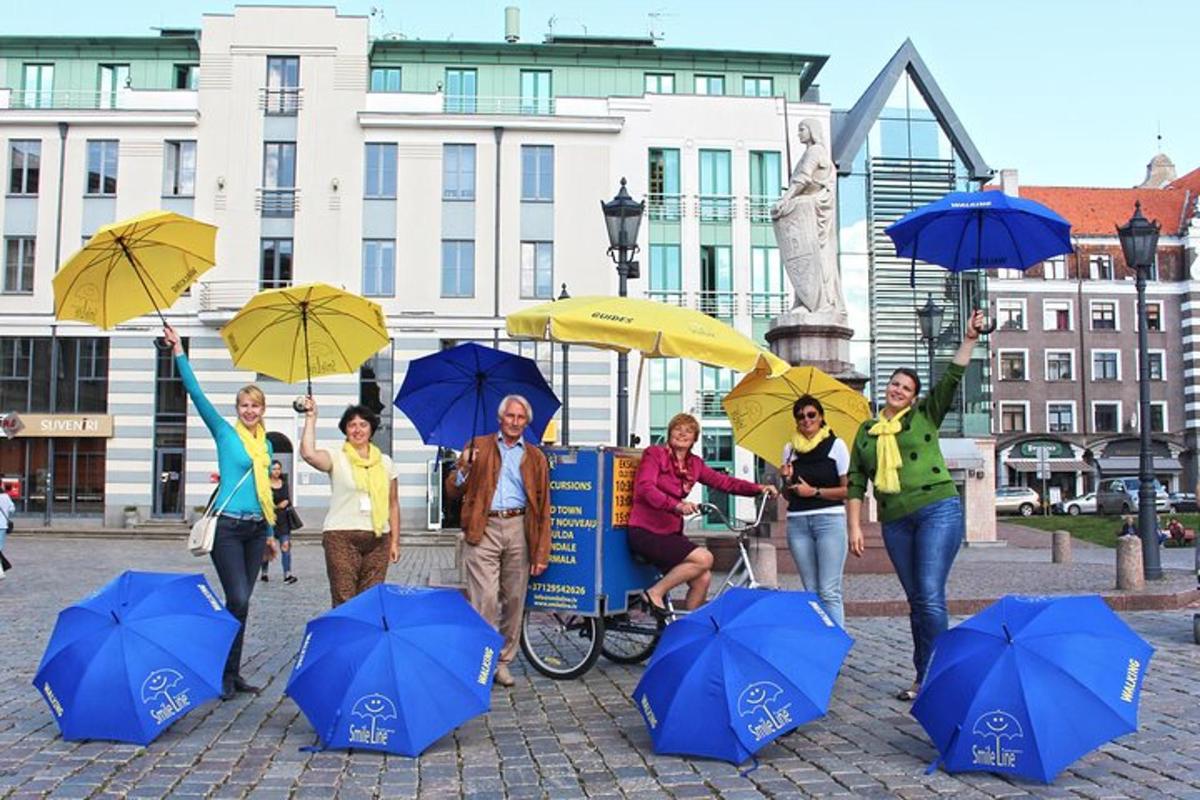 a group of people with umbrellas on a street