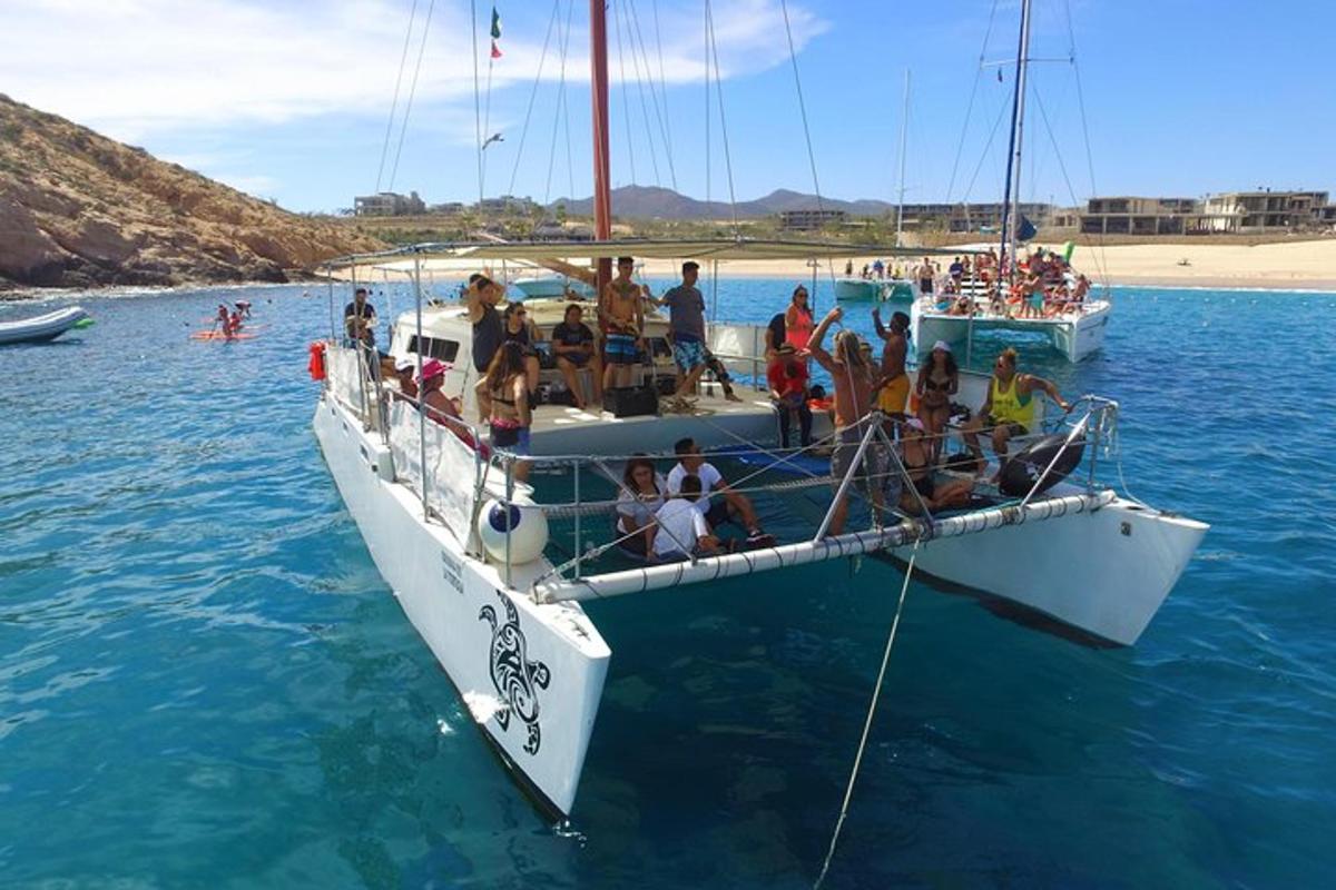 a group of people on a boat in the water