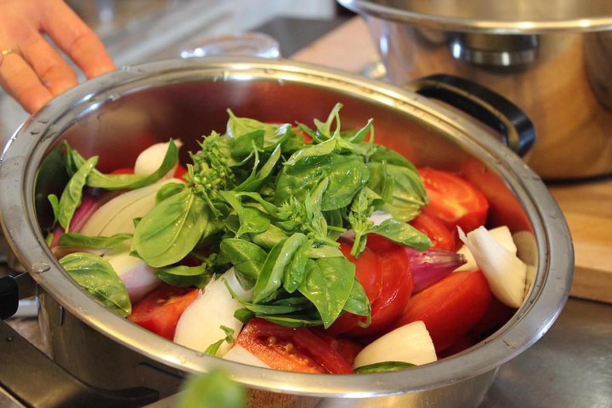 a pot filled with vegetables on top of a stove