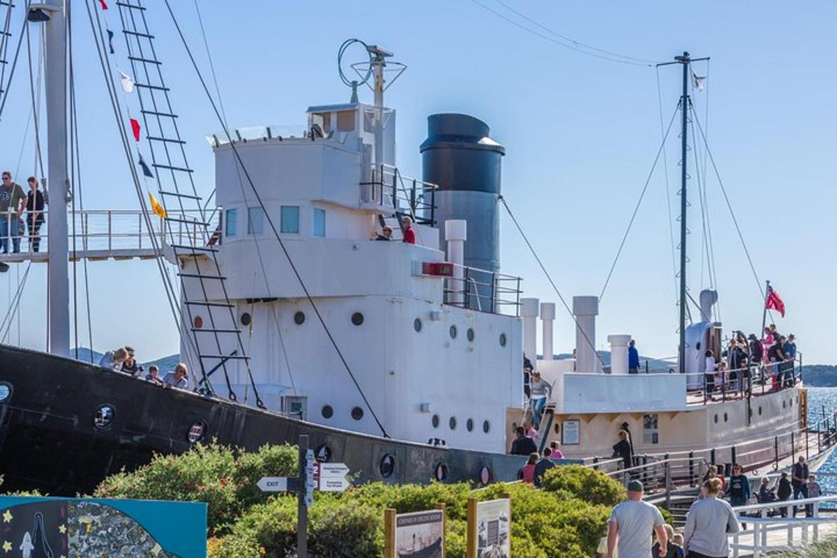 a large boat is docked in the water