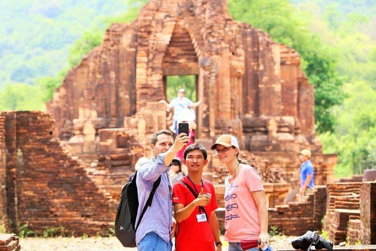 a group of people standing in front of a temple