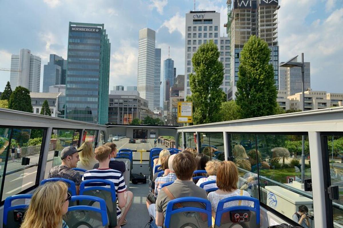 a group of people sitting on a bus