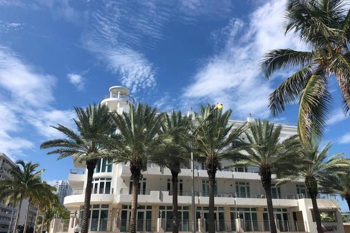 a building with palm trees in front of it