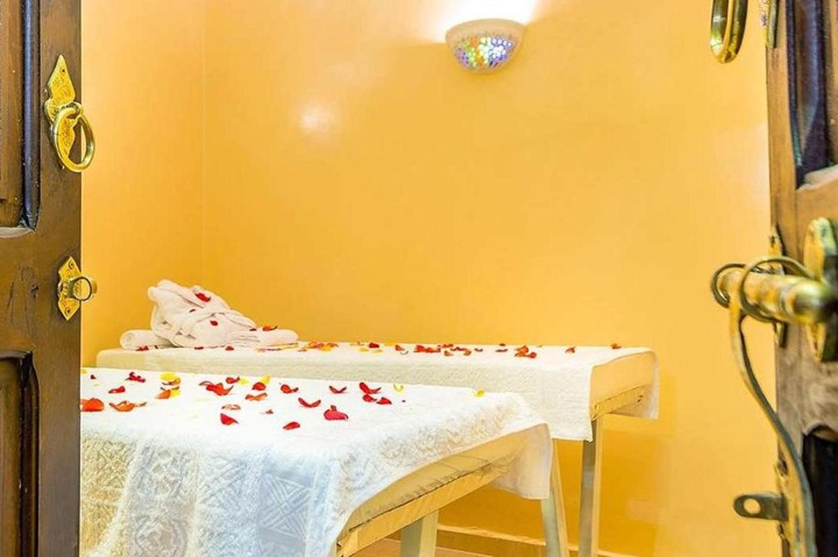 a room with a table with flowers on it