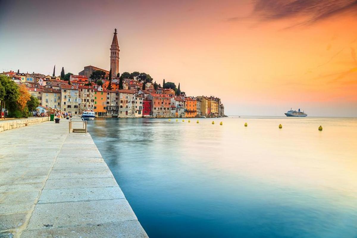 a large body of water with buildings and a city