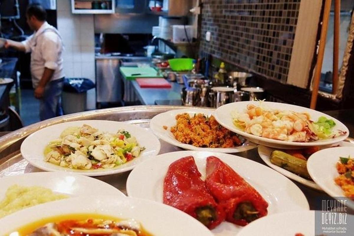 a buffet with plates of food on a table