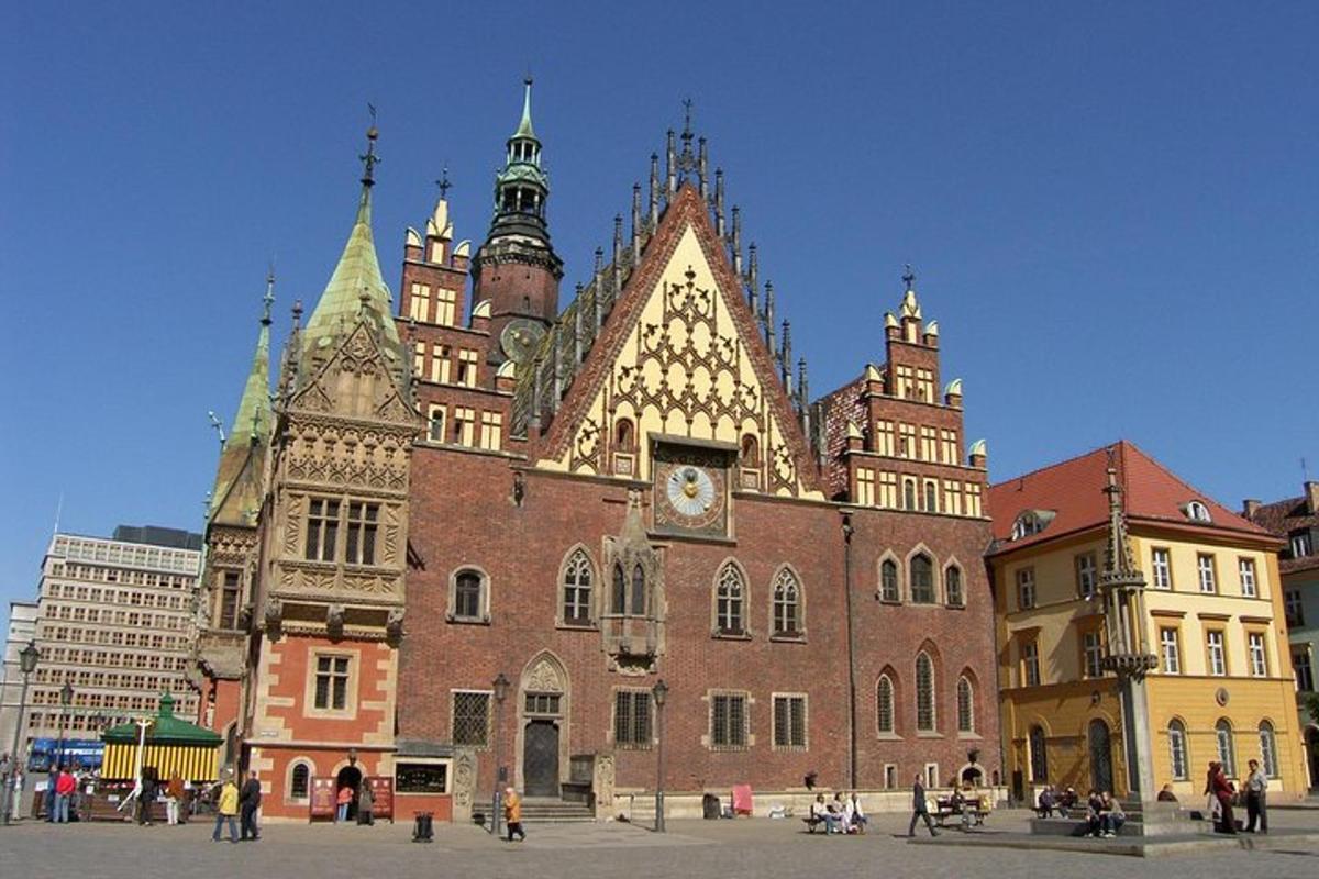 a large brick building with a clock on it