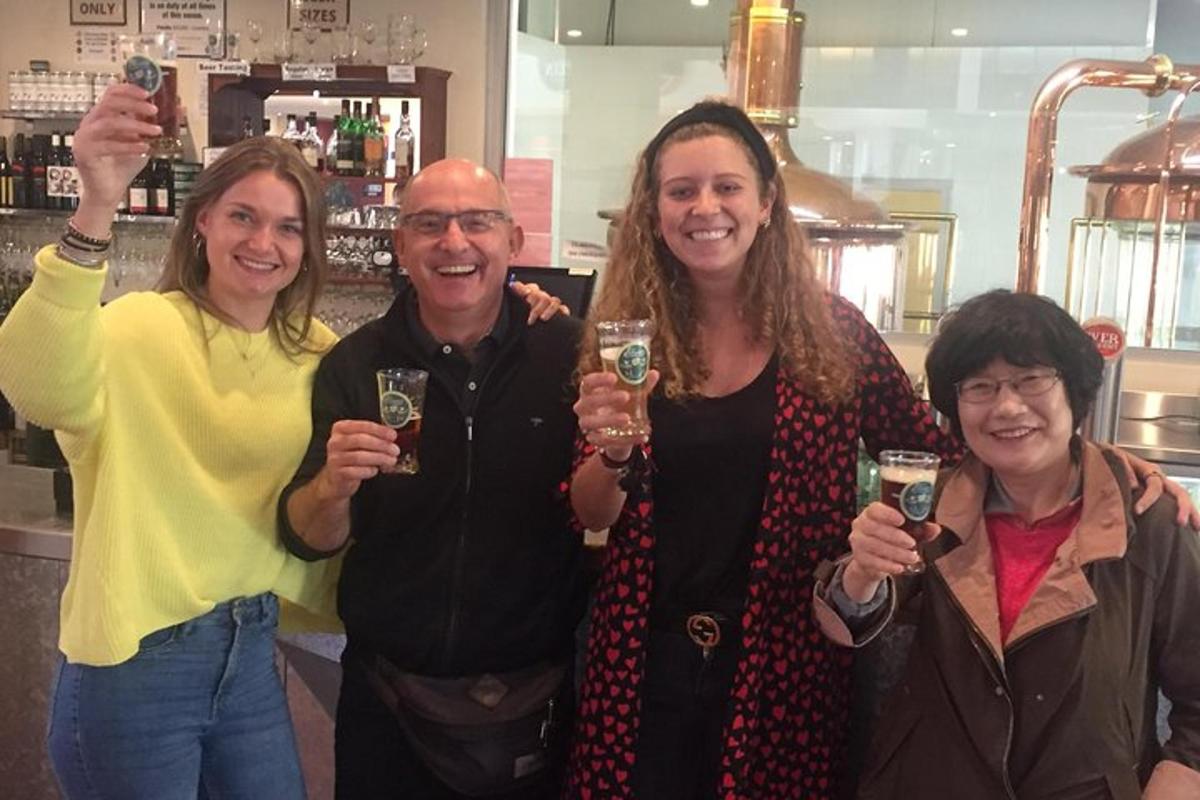 a group of people holding up glasses of wine