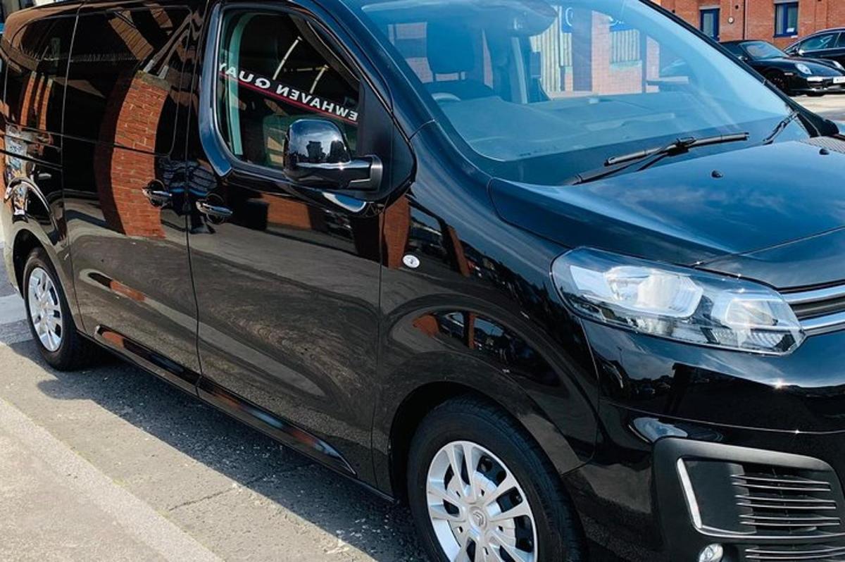 a black van parked in a parking lot
