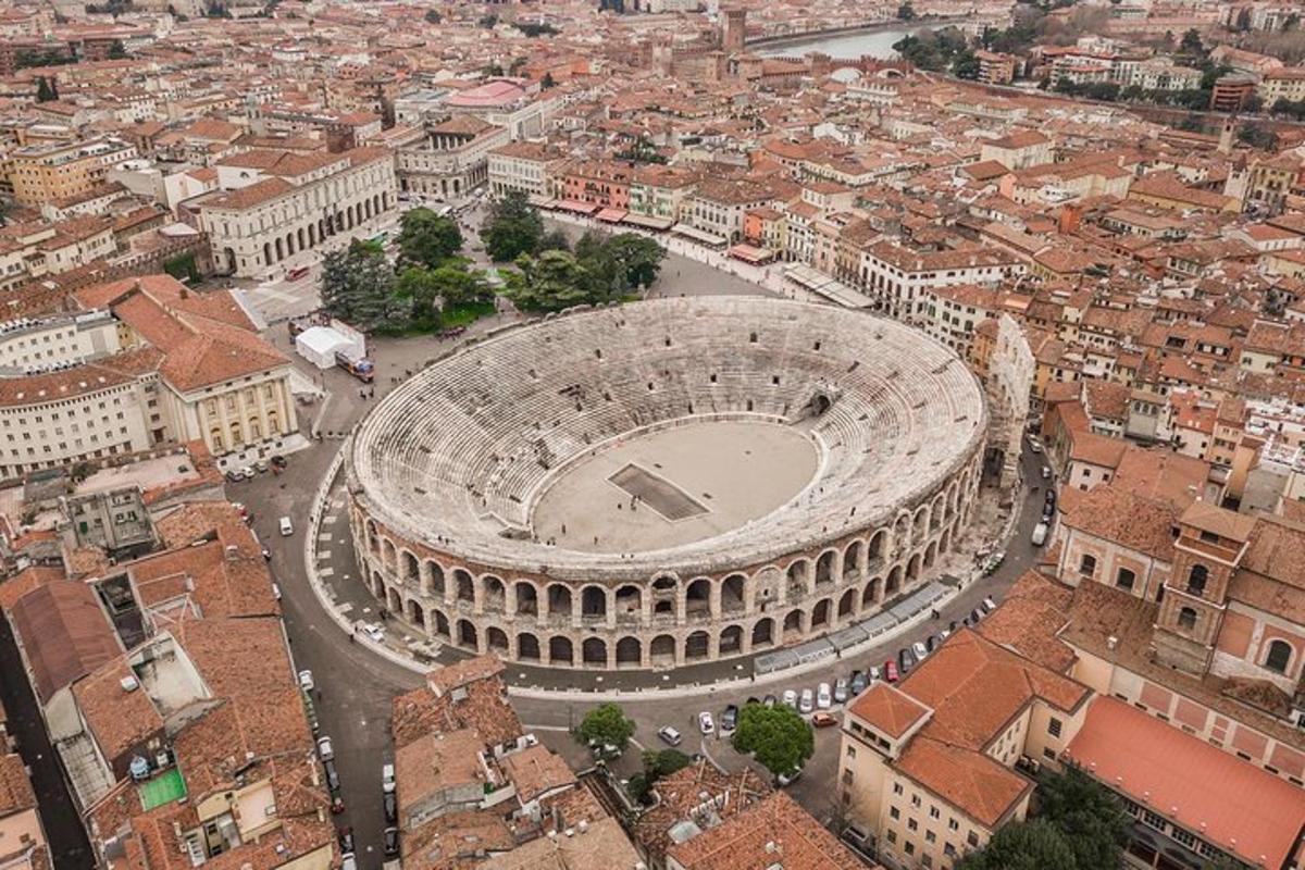 an aerial view of the coliseum in a city