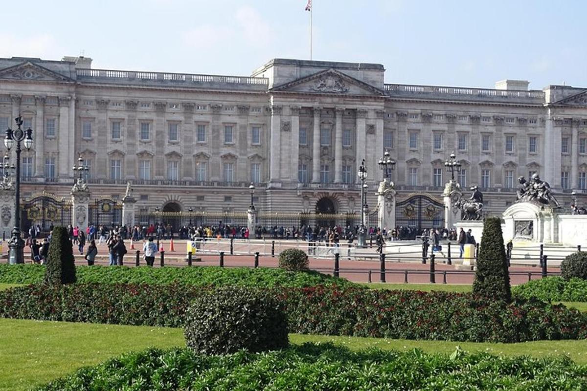 a large building with people walking in front of it