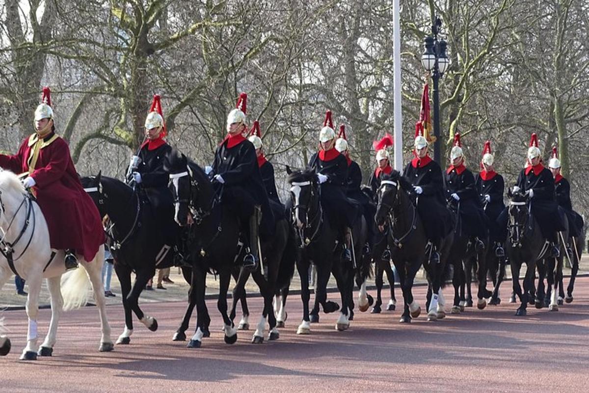 a group of men in santa hats riding on horses