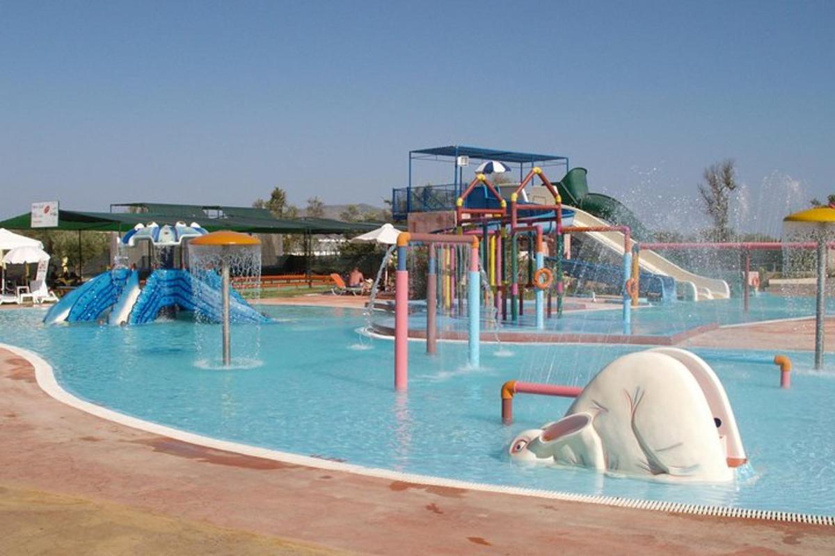 a water park with a water slide and slides