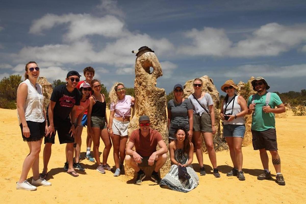 a group of people standing in front of a statue