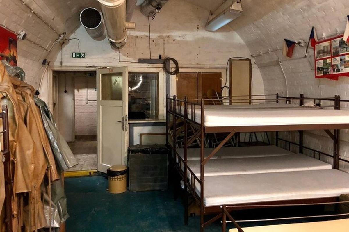 an empty bus with two bunk beds in it