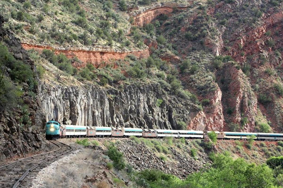 a train on a track on a mountain