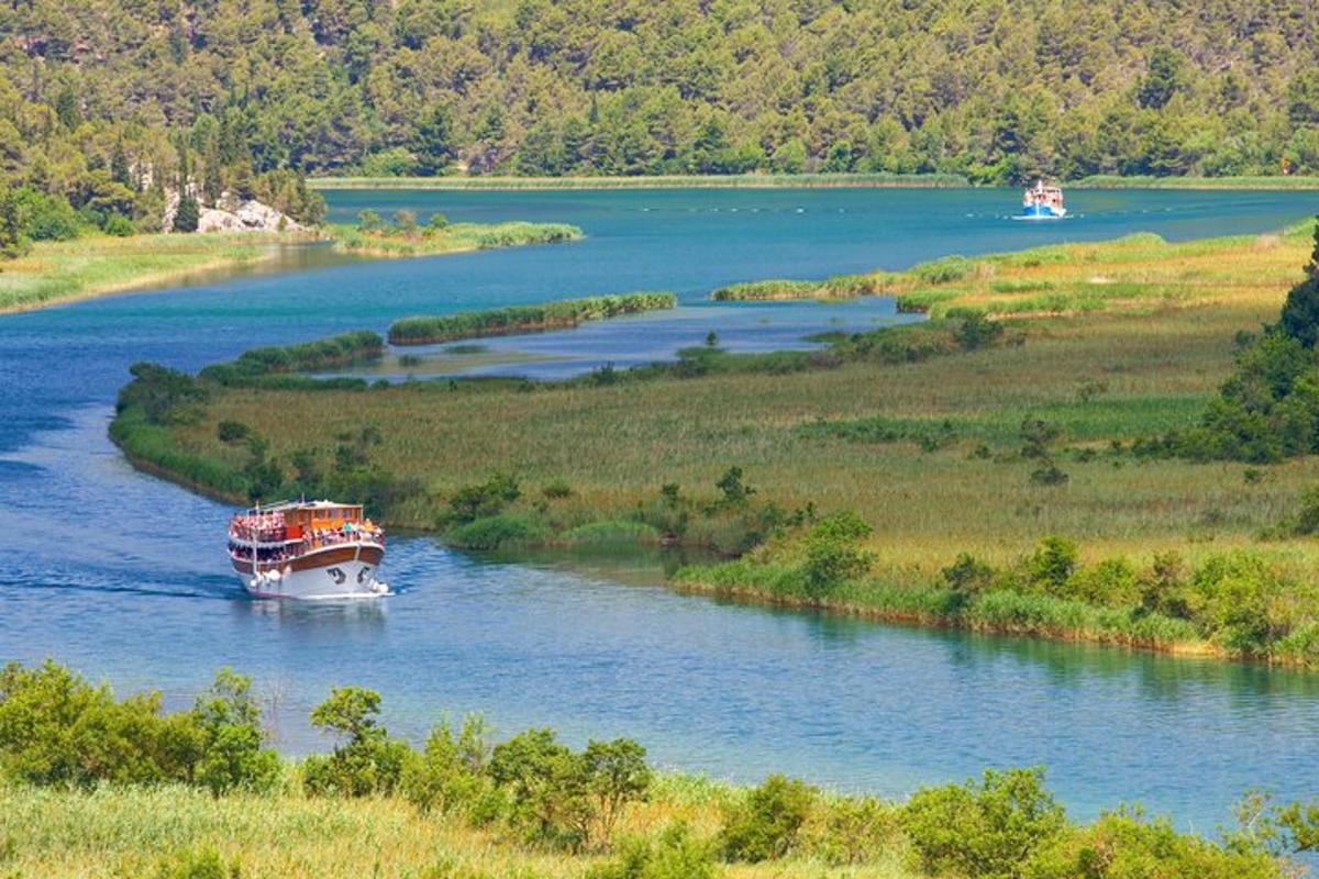 a boat is traveling down a river