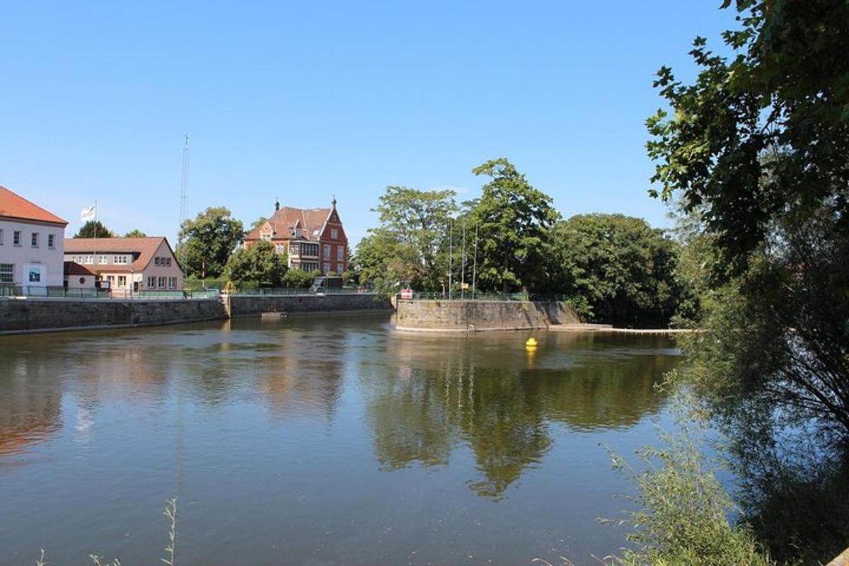 a view of a river with houses and buildings