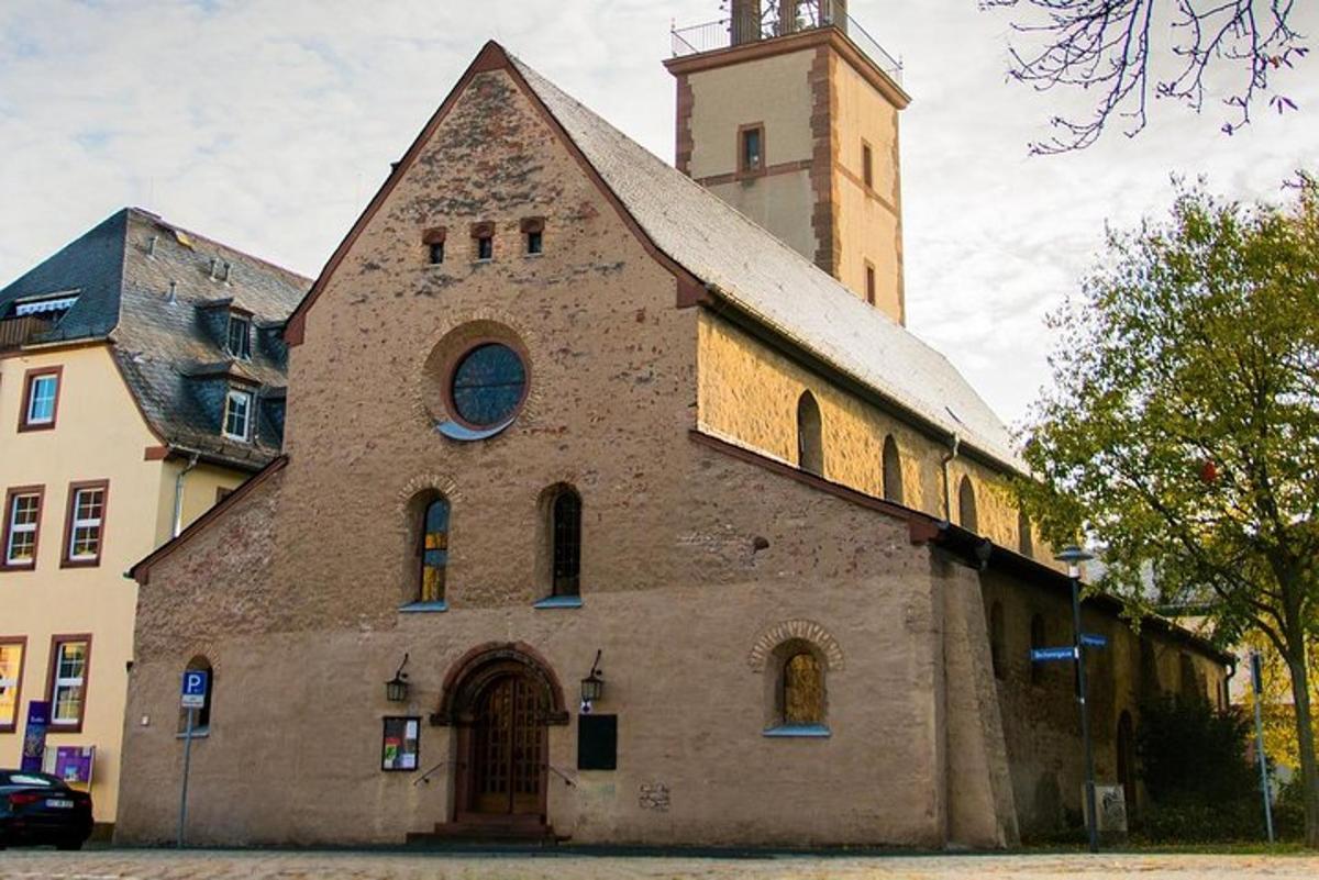 an old stone church with a clock tower