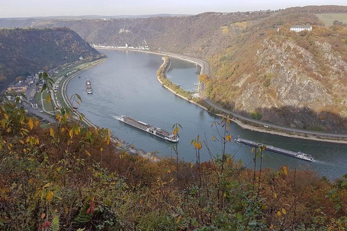 a river with boats in it and a bridge