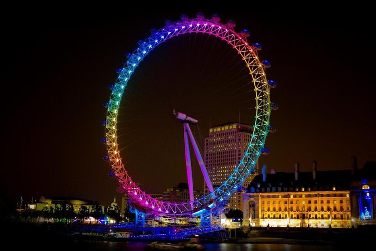 a large ferris wheel lit up at night