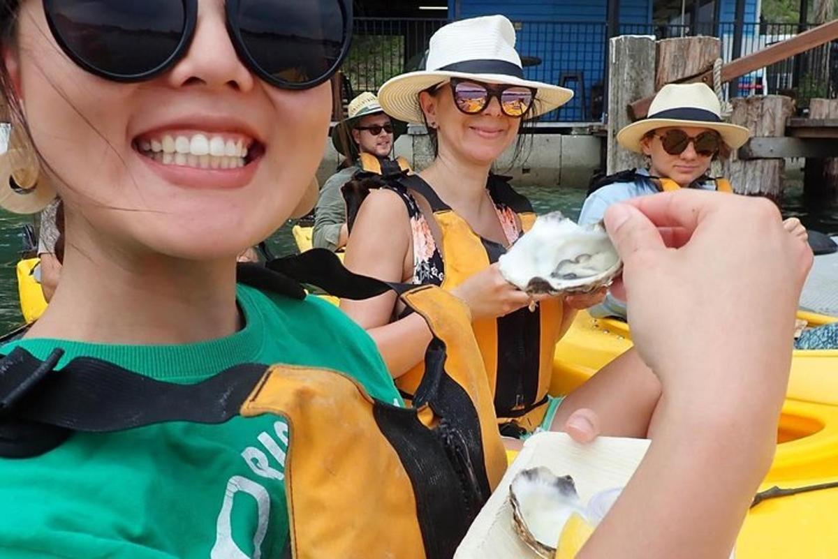 a group of women sitting on a raft eating food