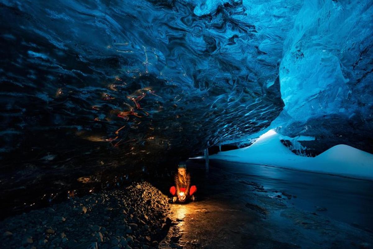a fire hydrant in an ice cave at night