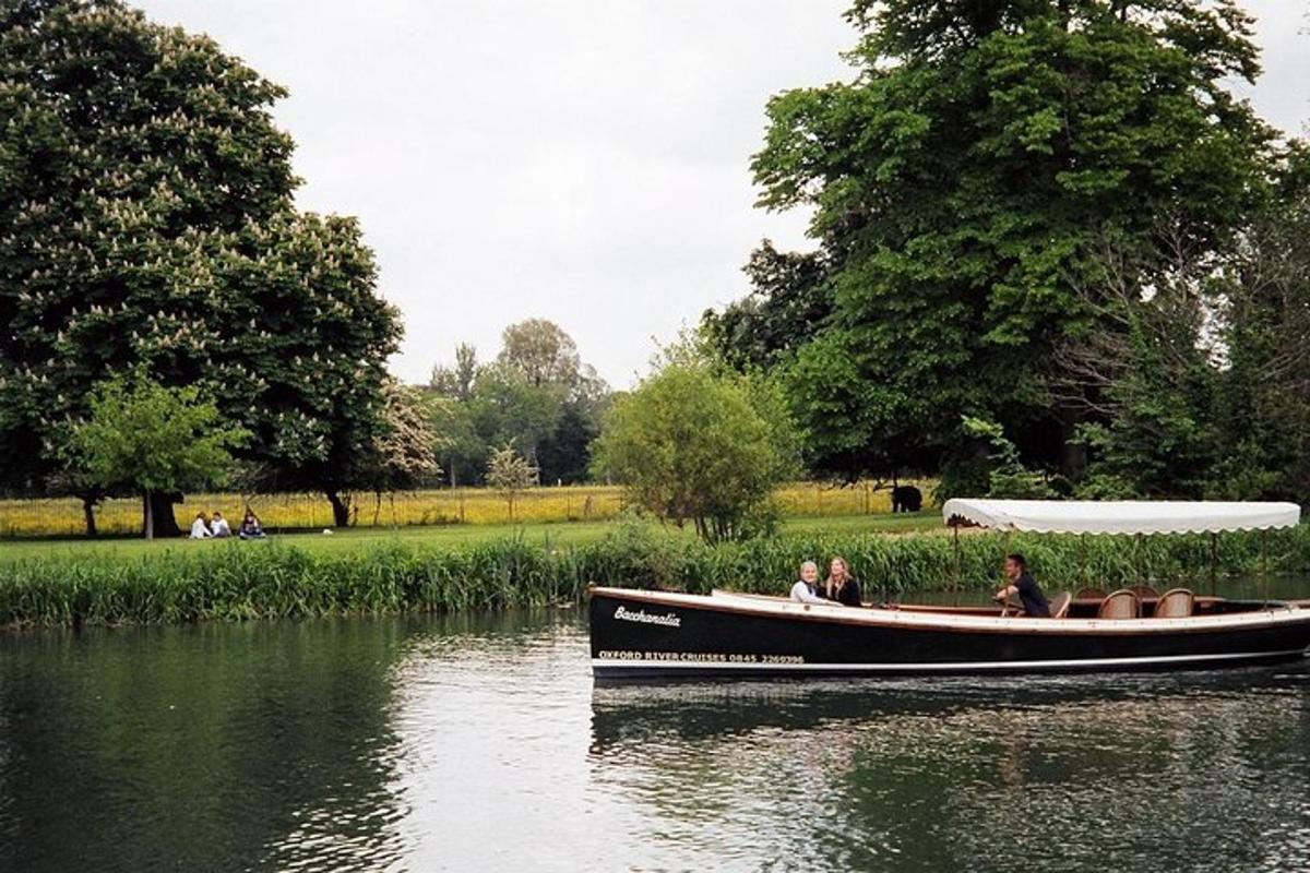 a group of people in a boat on the water