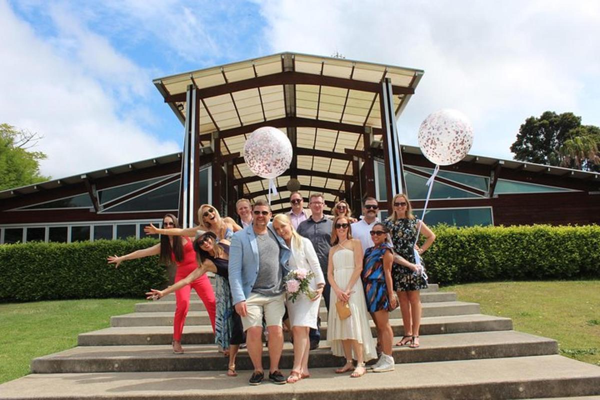 a group of people standing on steps in front of a building