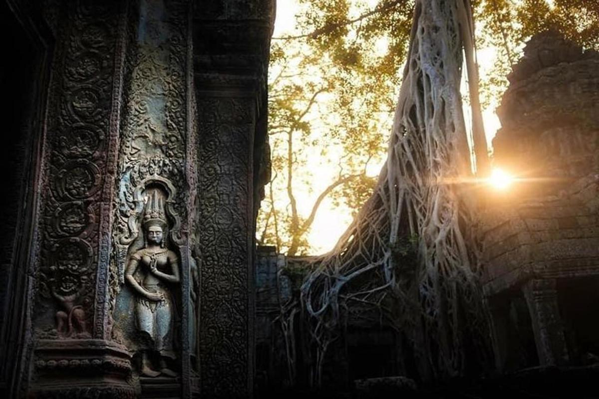 a statue of a deity standing next to a building