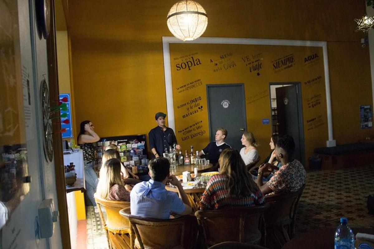 a group of people sitting at a table in a restaurant