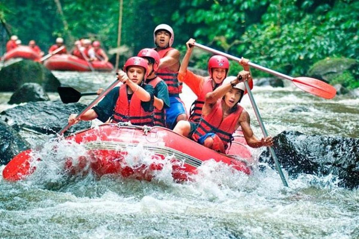 a group of people in a raft on a river