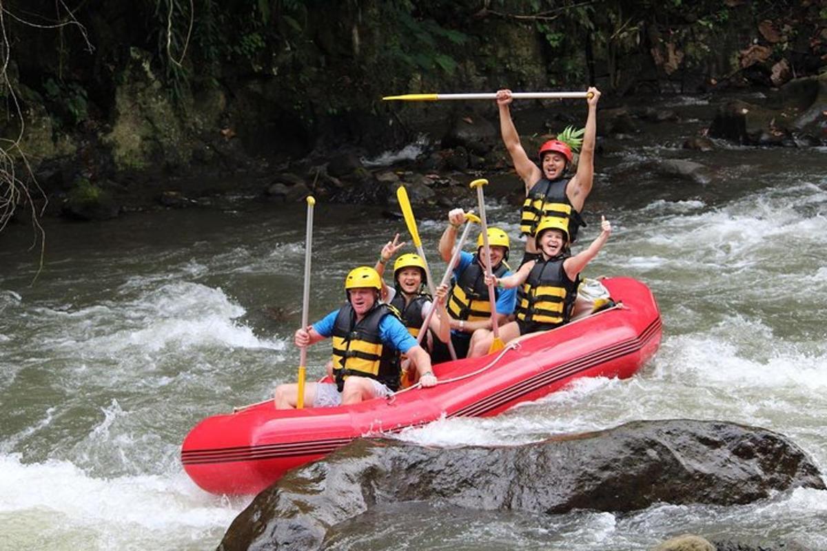 a group of people in a raft in a river