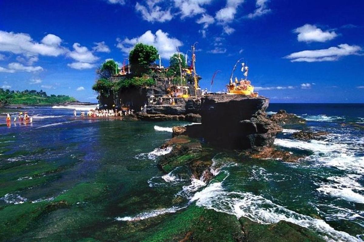an island in the ocean with people on it