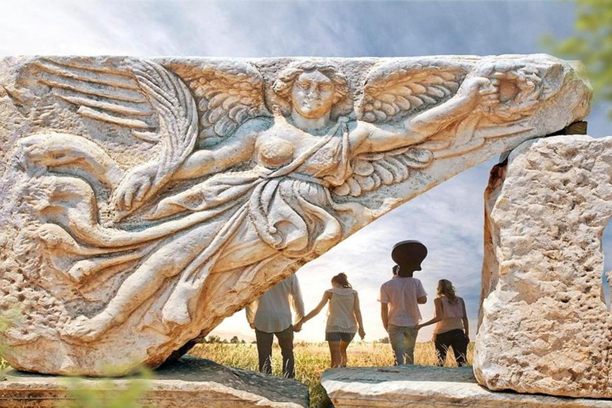 a group of people standing in front of a statue