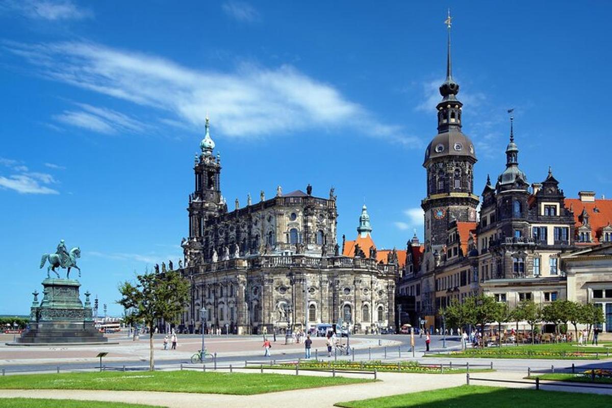 a large building with two towers in a city